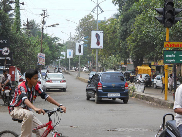 NR. COLLEGE ROAD (CANADA CORNER TO PATIL PLAZA) hoarding